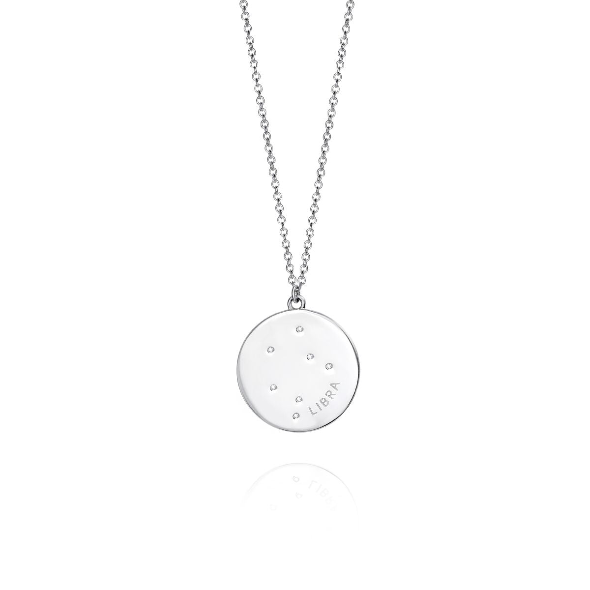 Silver necklace with round pendant featuring star constellation design for Libra.