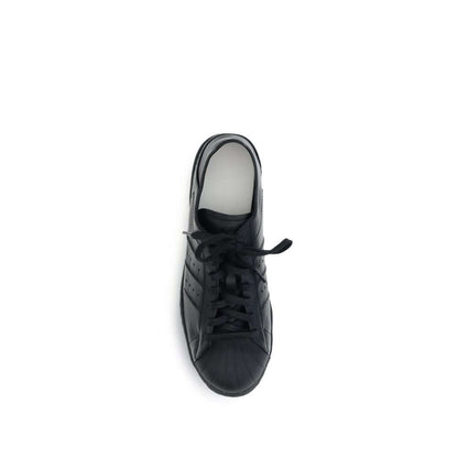 Y-3 Black Calf Leather Bos Taurus Sneakers with classic rubber shell toe viewed from above.