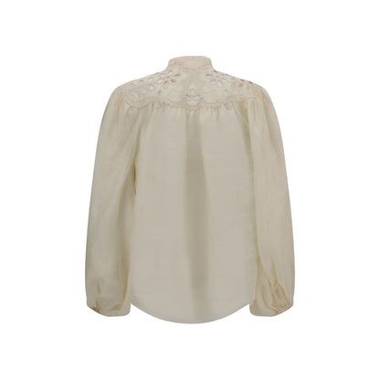 Zimmermann Cream Ramie Blouse with embroidered lace details and puff sleeves viewed from the back.